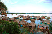 220px-Amazonas_floating_village,_Iquitos,_Photo_by_Sascha_Grabow
